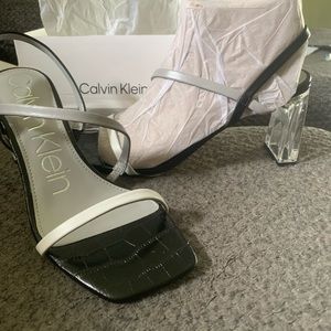 Calvin Klein New in Box strappy clear heeled sandals. Size 7m.